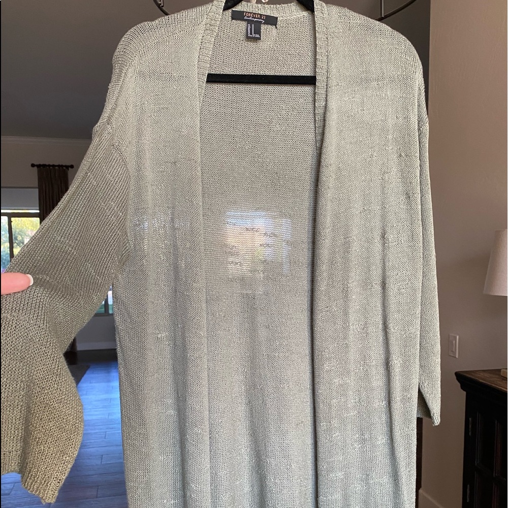 Cute sweater knit long cover! Worn once.. sage color, size M
